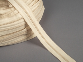 Молния витая рулонная Т3 (8,3гр/м) св.бежевый*307 (рул.400м)